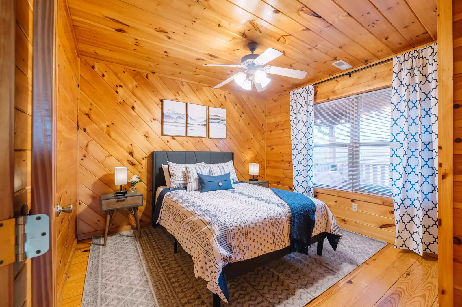 Bedroom #3: This second floor bedroom has a queen-size bed overlooking the backyard