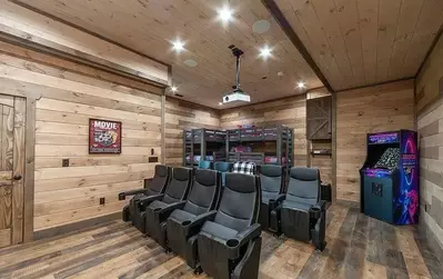 Private theater with bunk beds and arcade!