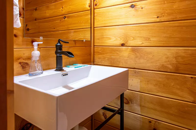 Half bath on main/entry level with sink and toilet