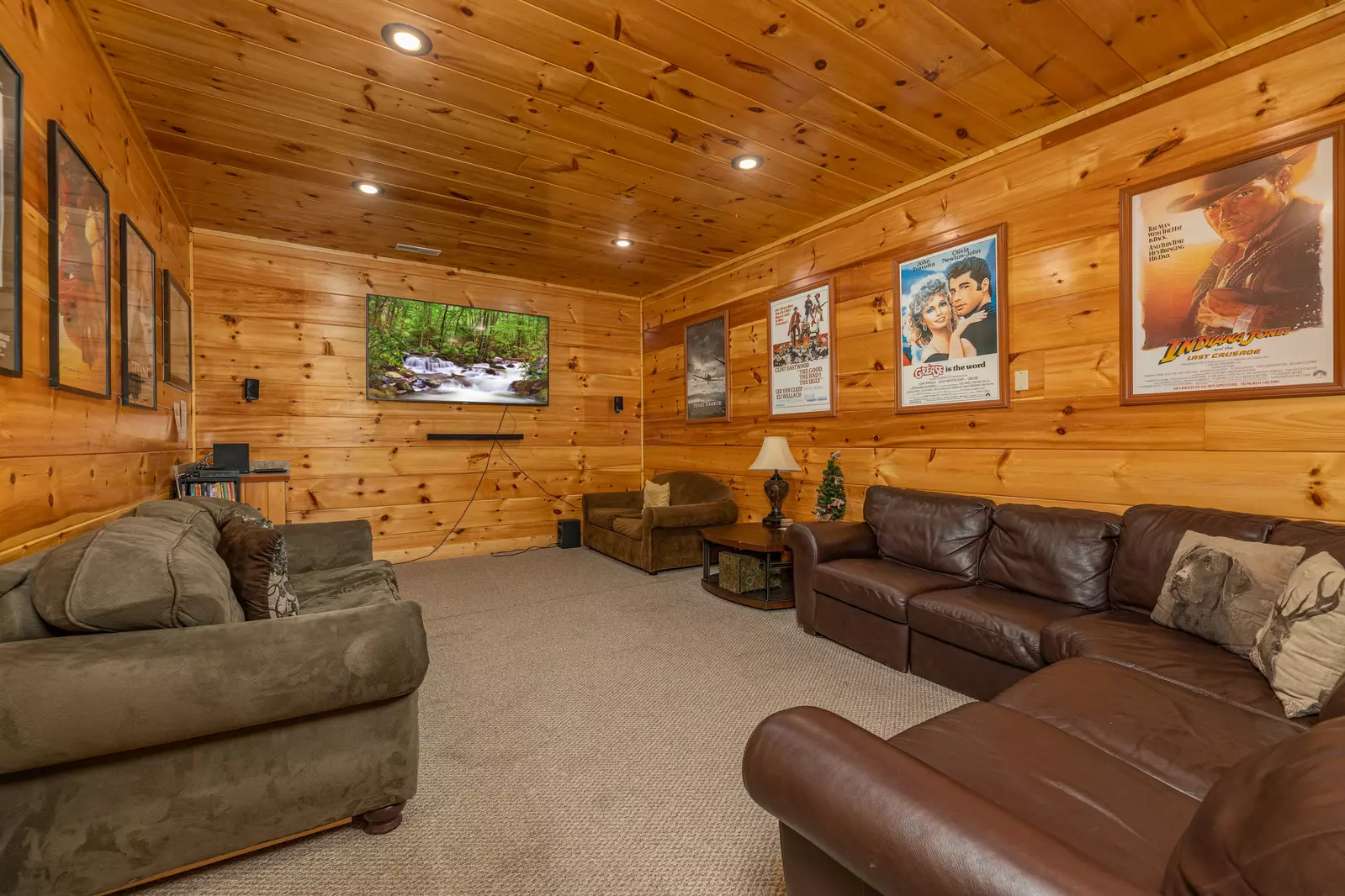 theater room with 85" smart tv