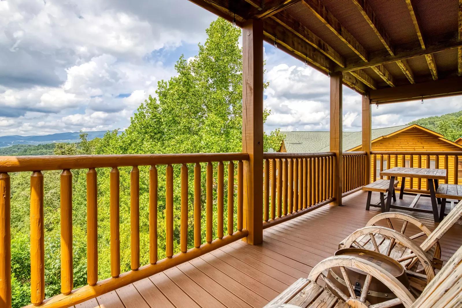 Awesome Views main level deck with rocking chairs and picnic table