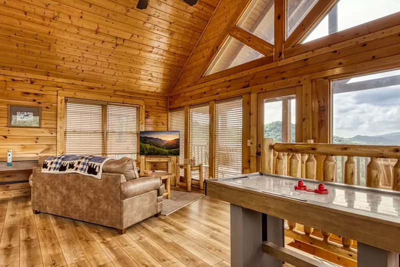 Awesome Views upper level loft area with sitting area and air hockey table