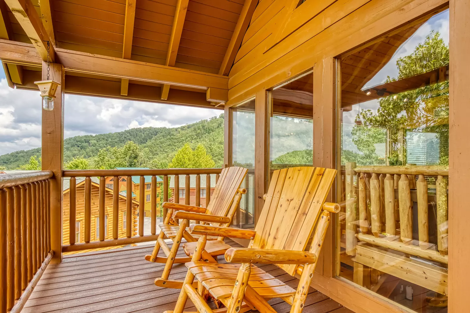 Awesome Views upper level deck with rocking chairs