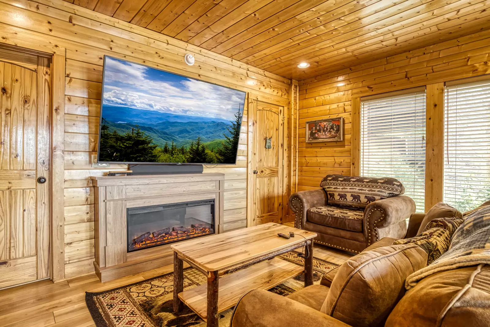 Awesome Views lower level sitting area with 75 inch TV