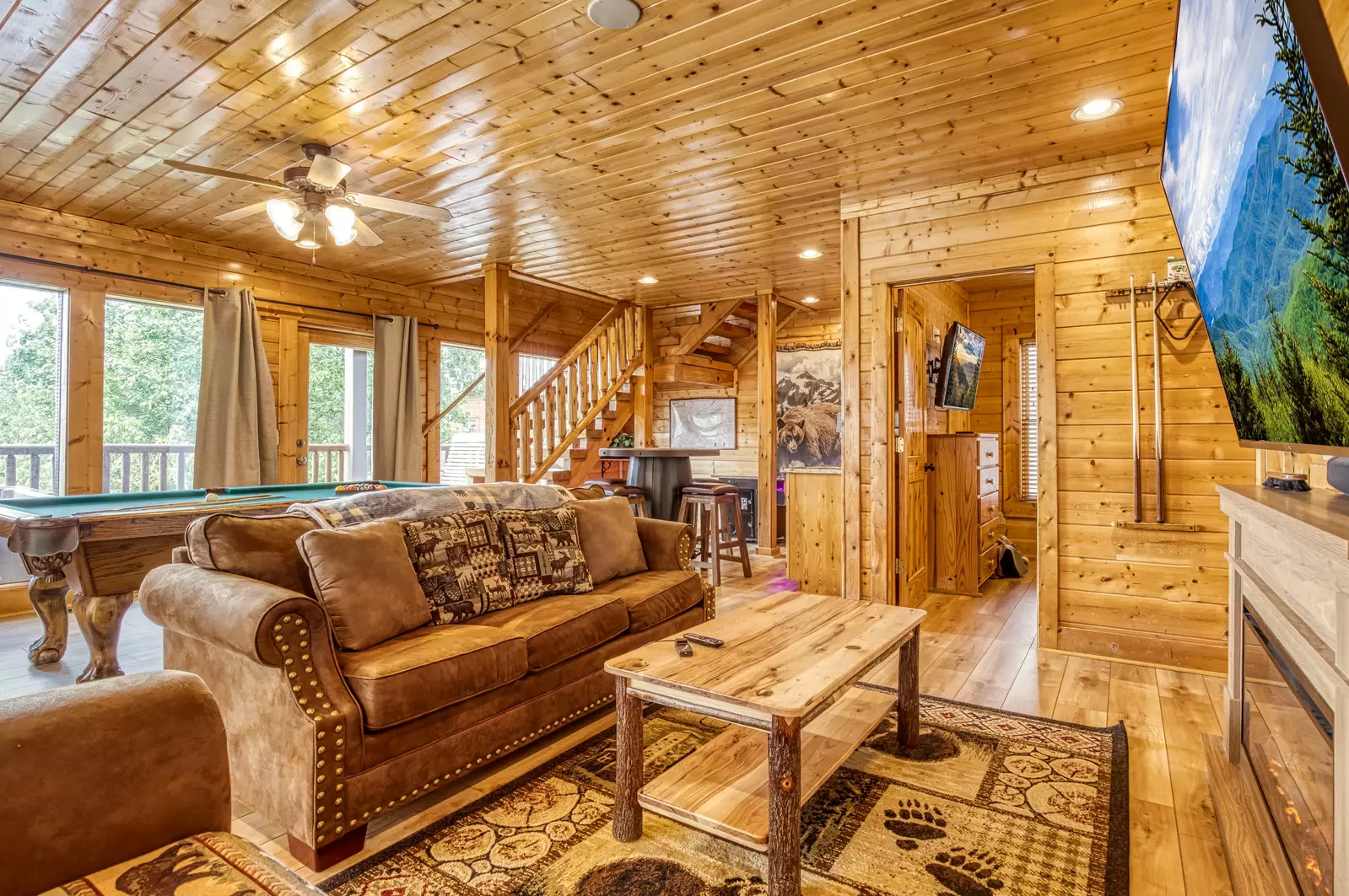 Awesome Views lower level sitting area with 75 inch TV and pool table