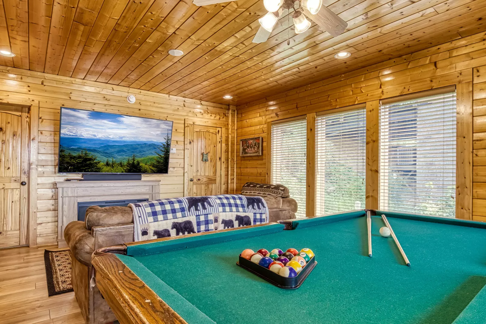 Awesome Views lower level game room with pool table and 75 inch TV