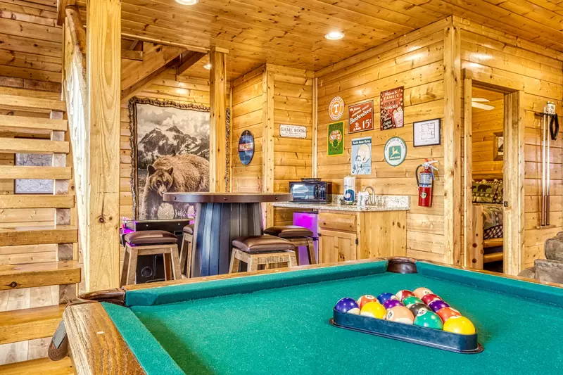 Awesome Views lower level game room with pool table and cocktail style arcade game