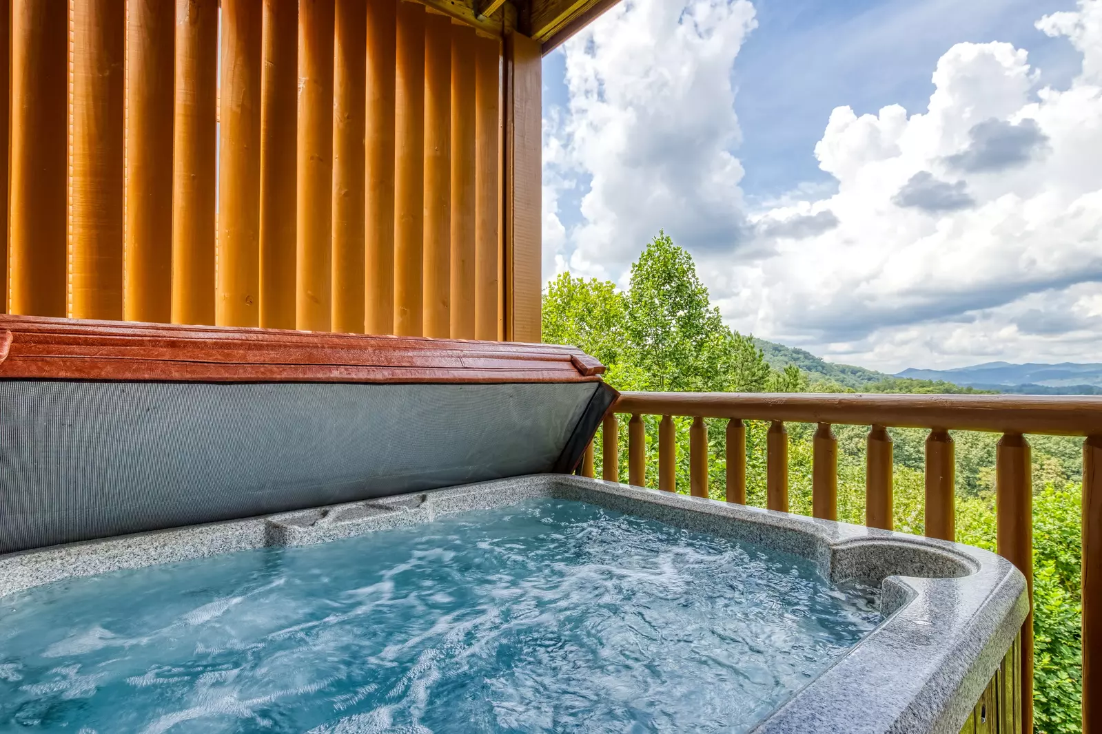 Awesome Views lower level deck with hot tub
